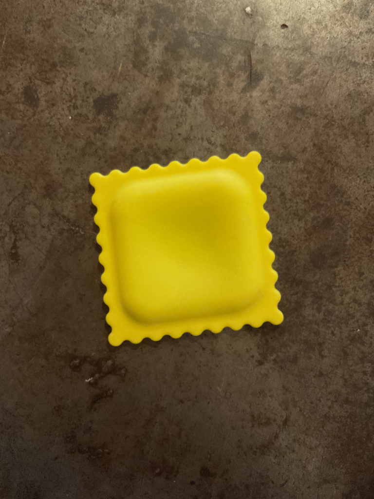 Raviol- soporte cuchara 